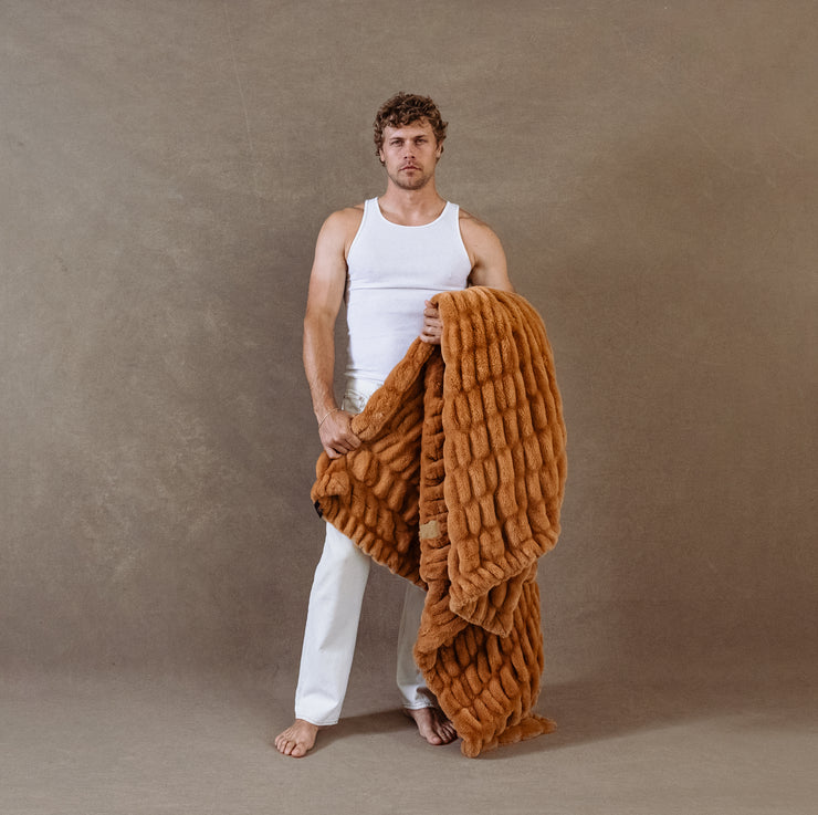 Stardust Faux Fur Blanket by Lola Blankets on Male Model