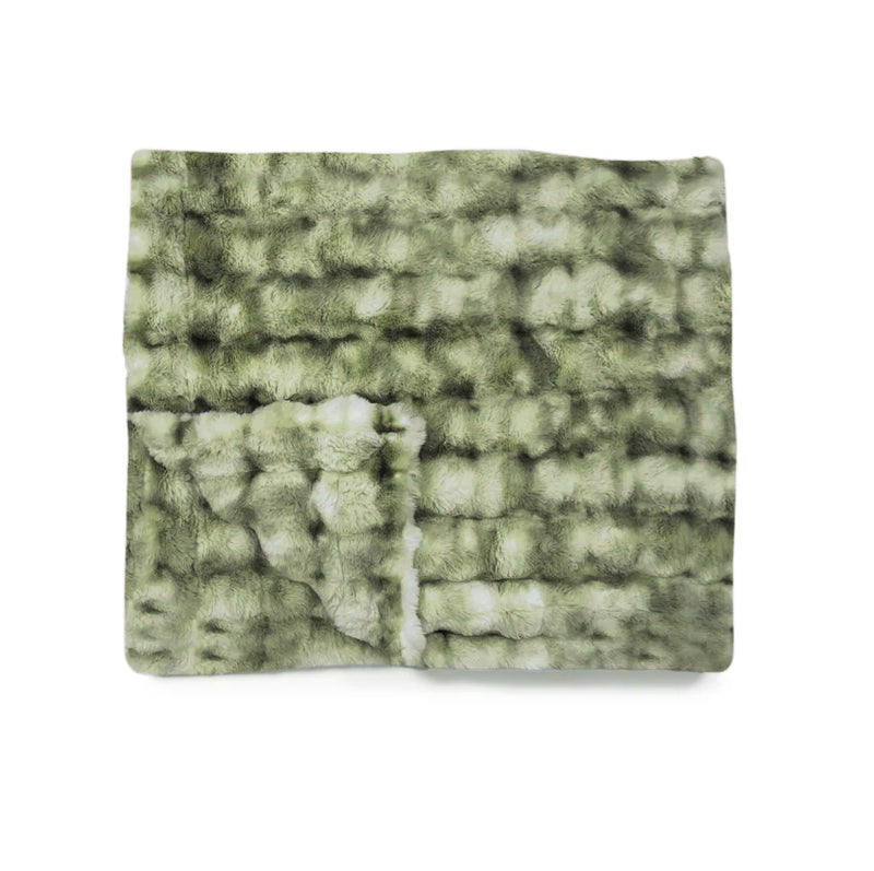 Marbled green textured blanket on a white background