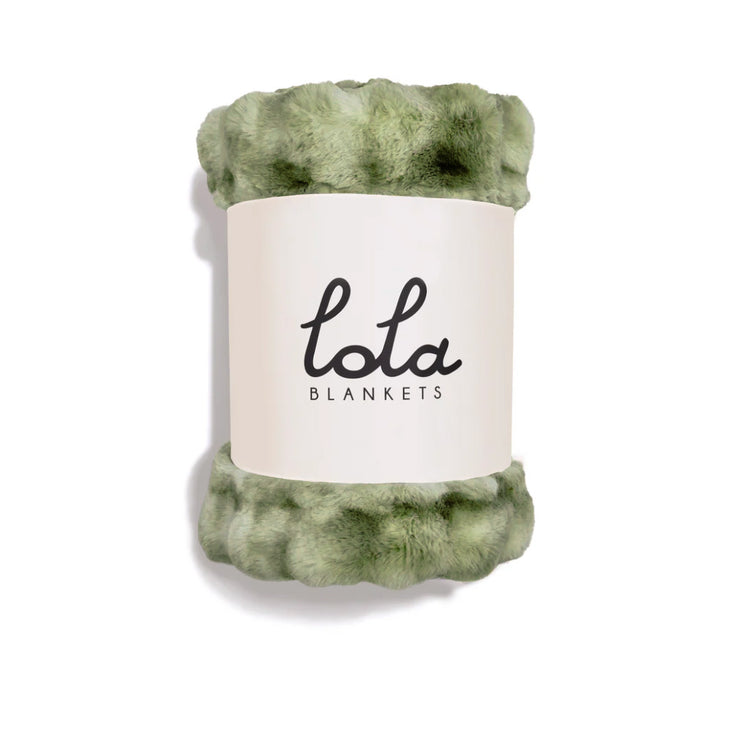 Green and white blanket with &