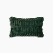 Dark green textured rectangular pillow on a white background