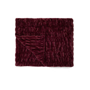 Textured burgundy blanket on a white background