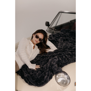 Charcoal Grey Faux Fur Blanket on Car with Female Model