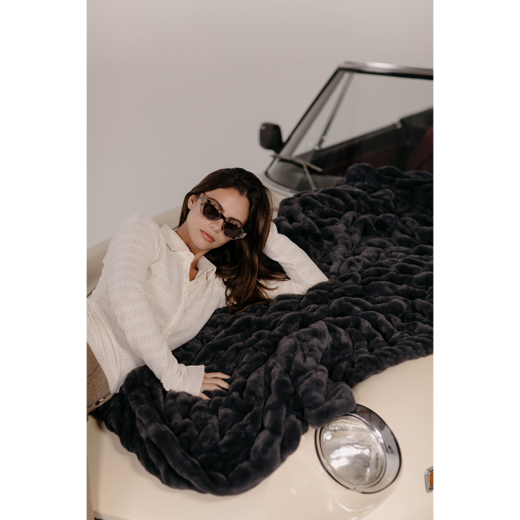 Charcoal Grey Faux Fur Blanket on Car with Female Model