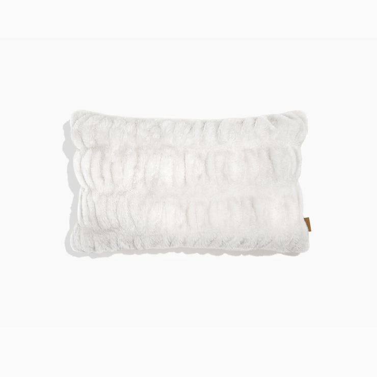 White textured pillow on a white background