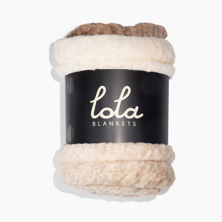 Lola Blankets product with beige and brown texture on a white background