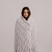 Moonbeam Faux Fur Blanket by Lola Blankets on Female Model