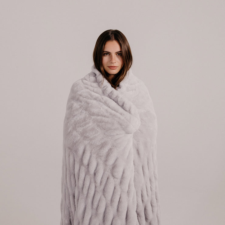 Moonbeam Faux Fur Blanket by Lola Blankets on Female Model