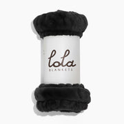 Black fleece blanket with 'lola blankets' branding on a white background