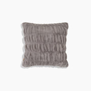 Textured gray pillow on a white background