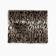 Animal print blanket on a white background